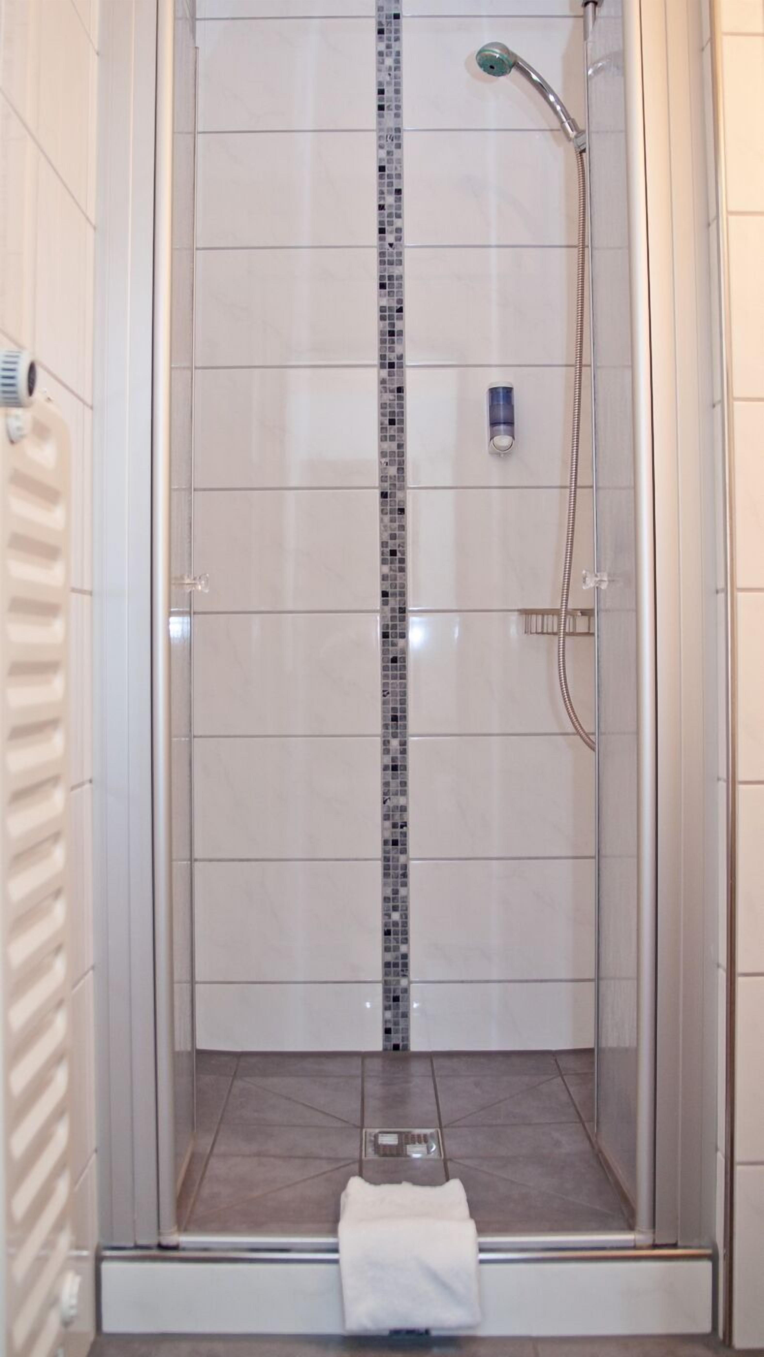 basic single room, 1 single bed | bathroom | hair dryer, towels, soap, shampoo