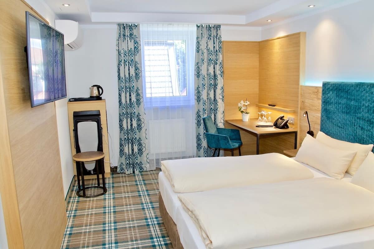 comfort quadruple room, 2 double beds | 1 bedroom, hypo-allergenic bedding, in-room safe, desk