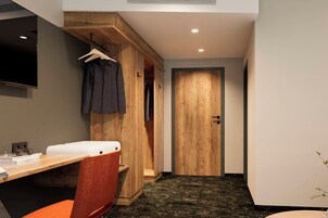 Habitación Deluxe | Ropa de cama hipoalergénica, caja fuerte, escritorio