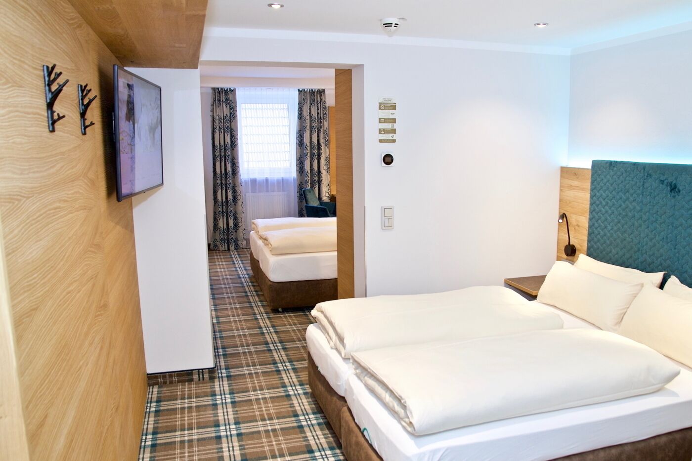 comfort quadruple room, 2 double beds | 1 bedroom, hypo-allergenic bedding, in-room safe, desk