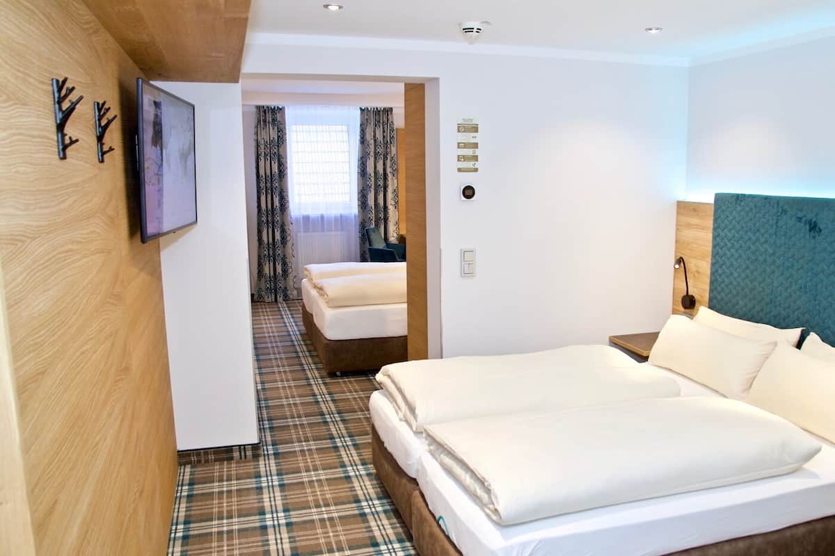 Comfort Quadruple Room, 2 Double Beds | Hypo-allergenic bedding, in-room safe, desk, laptop workspace