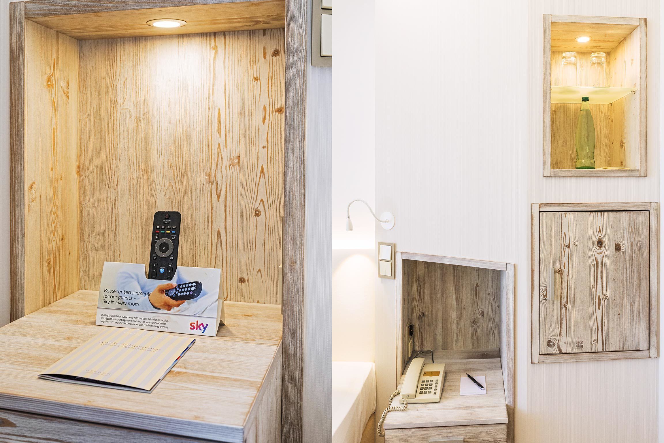 Un comptoir d’accueil en bois, équipé d’une télécommande, d’une publicité pour Sky et d’un téléphone.