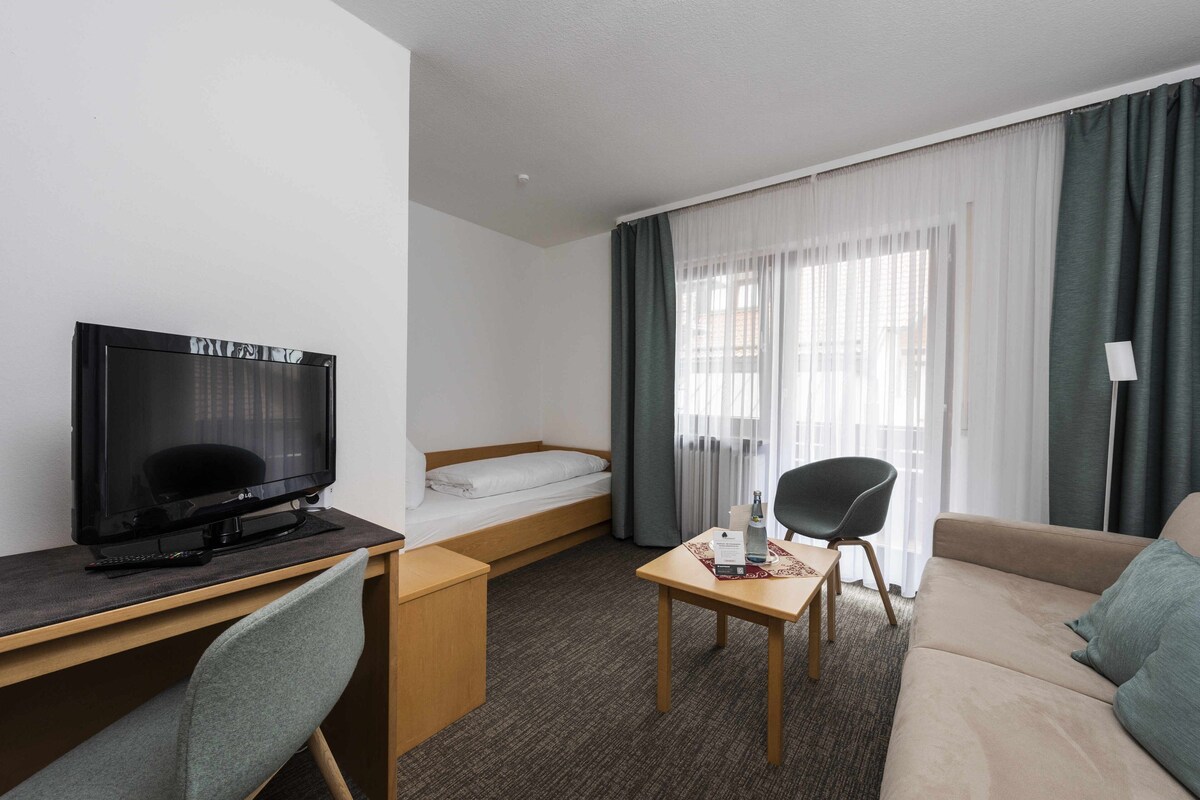 Desk, blackout drapes, iron/ironing board, free WiFi