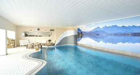 Indoor pool, open 6:30 AM to 10:00 PM, pool loungers. Victor's Seehotel Weingärtner