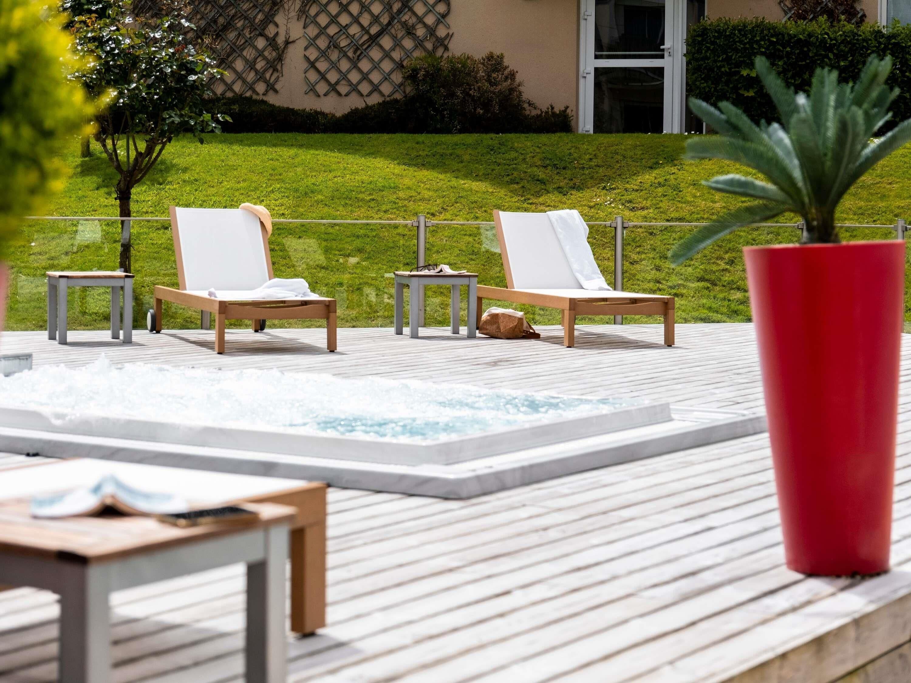 Outdoor pool, open 9:00 AM to 9:00 PM, pool umbrellas, pool loungers