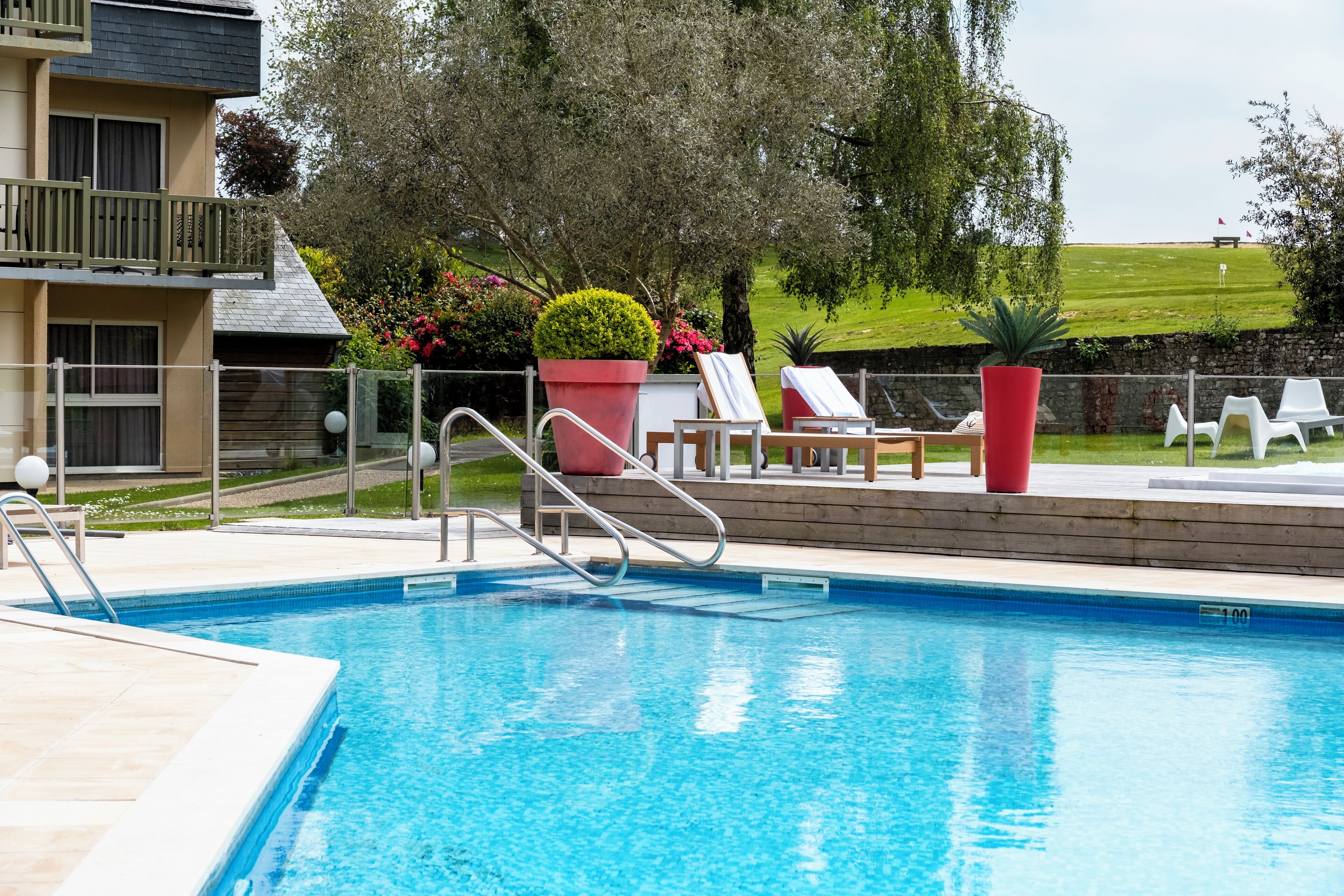 outdoor pool, open 7:00 am to 9:00 am, pool umbrellas, pool loungers