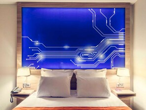 Roba de llit d'alta qualitat, minibar i caixa forta a l'habitació 