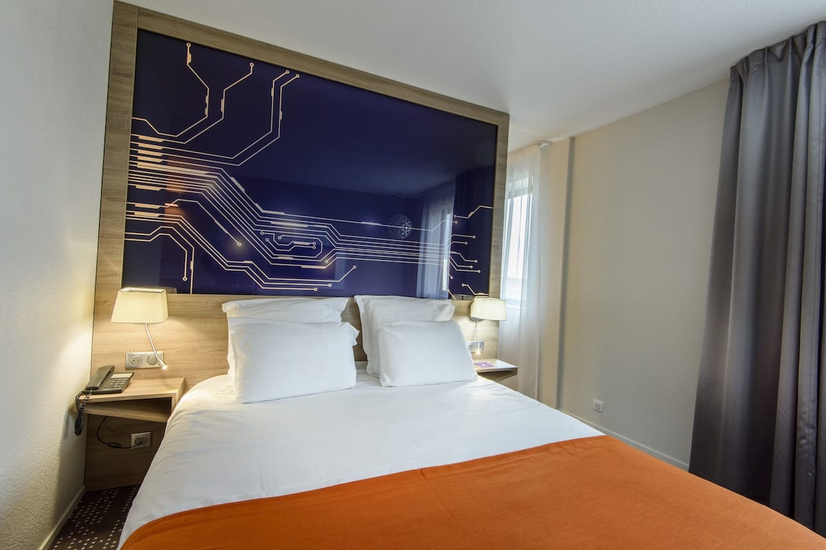 classic room, multiple beds | premium bedding, minibar, in-room safe, desk