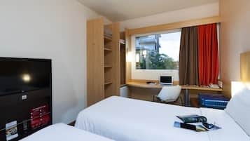 Ropa de cama de alta calidad, minibar, escritorio y cortinas blackout