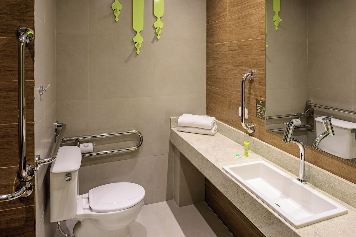 shower, eco-friendly toiletries, hair dryer, towels
