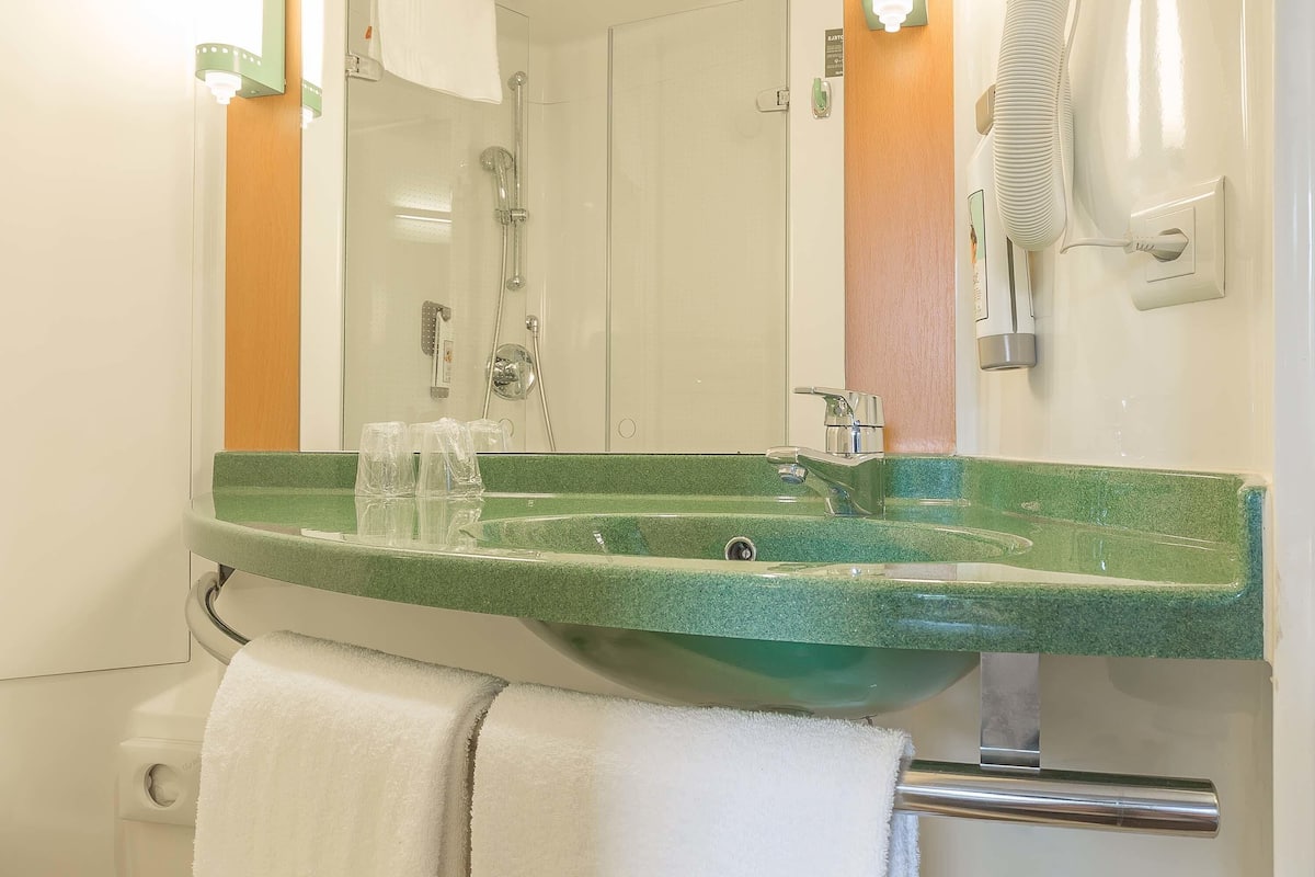 premium bedding, desk, blackout curtains, soundproofing