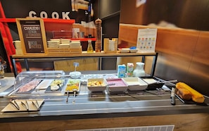 Daily buffet breakfast (CHF 19 per person)