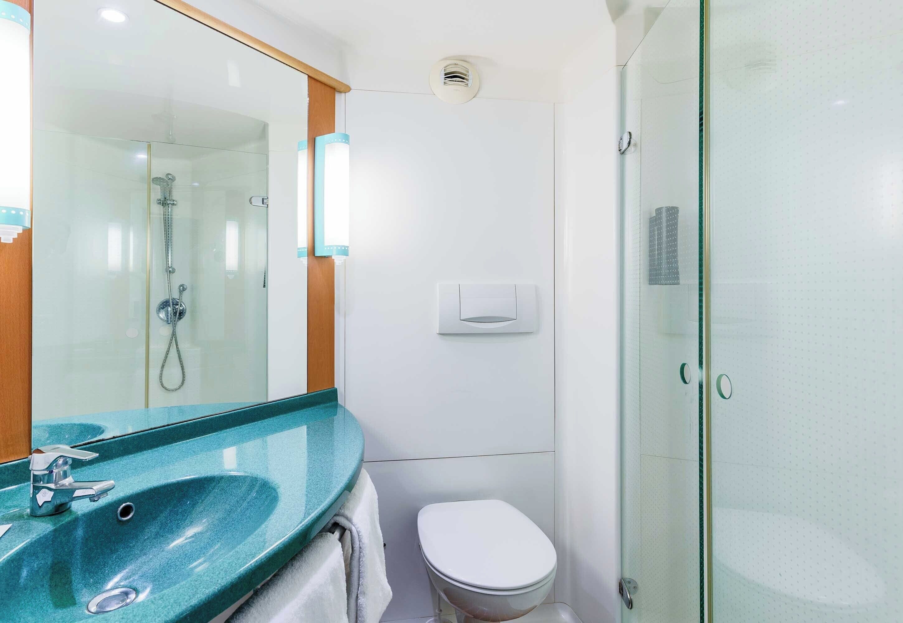 shower, eco-friendly toiletries, hair dryer, towels