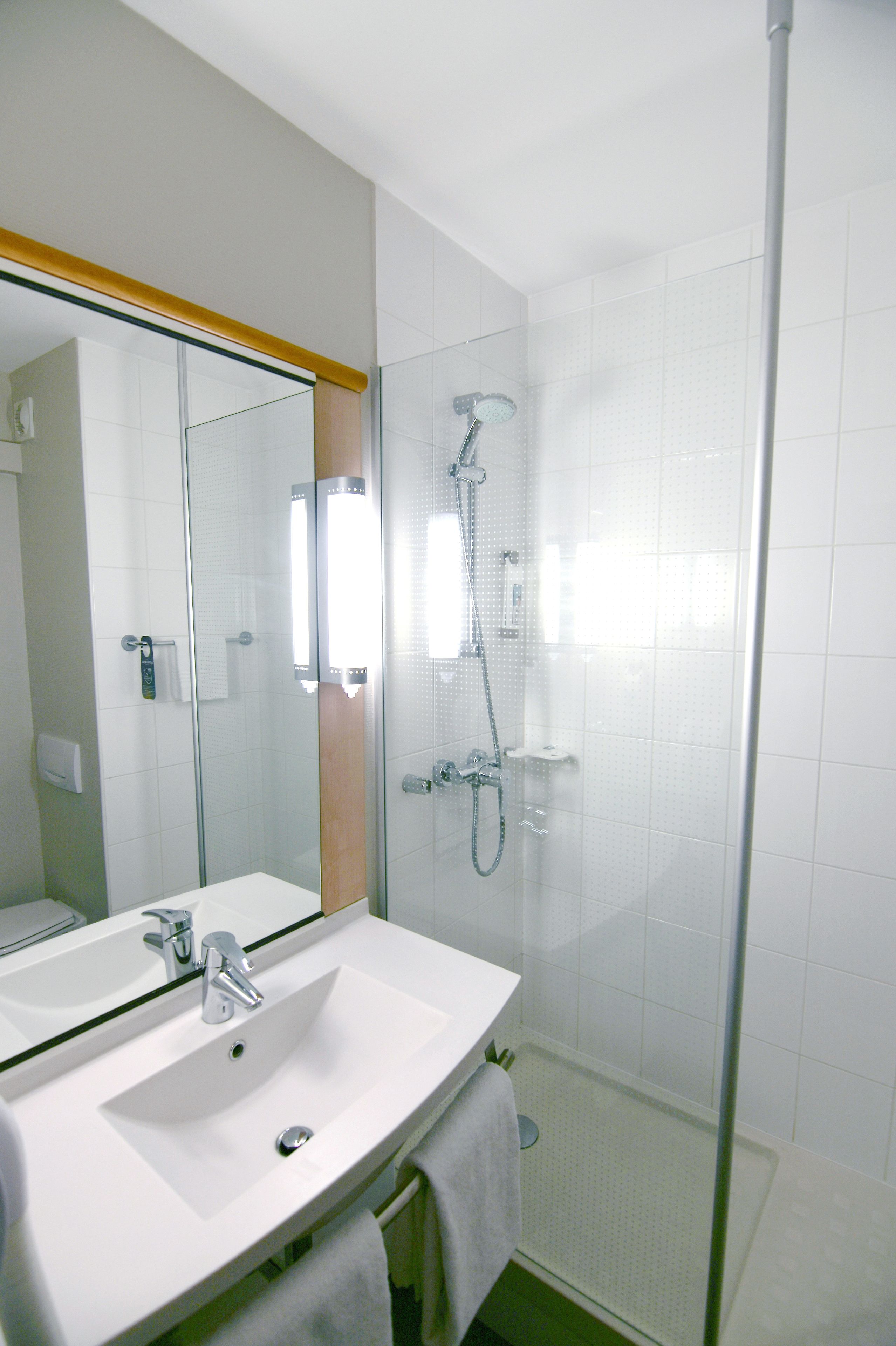 shower, eco-friendly toiletries, hair dryer, towels