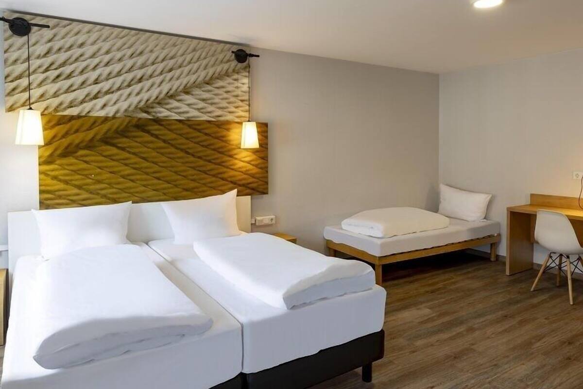 Desk, blackout curtains, free cots/infant beds, free WiFi