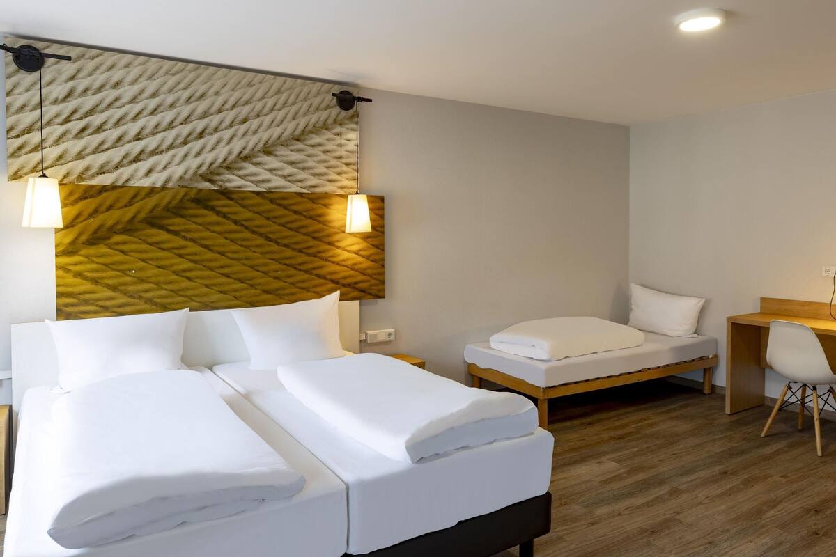 Desk, blackout curtains, free cots/infant beds, free WiFi
