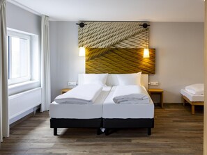 Desk, blackout curtains, free cots/infant beds, free WiFi