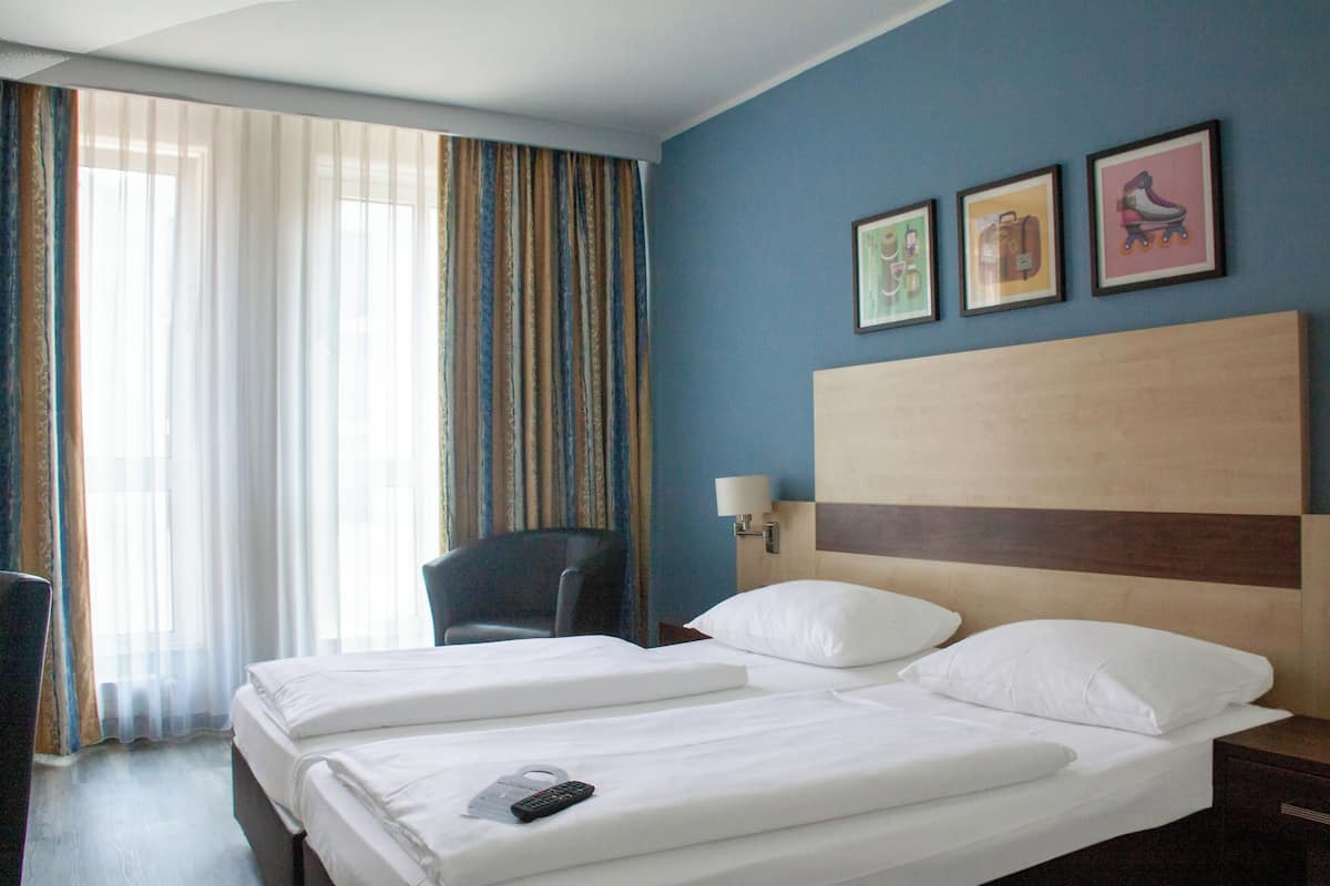 Standard Room, 2 Single Beds, Balcony, River View | In-room safe, desk, blackout curtains, soundproofing