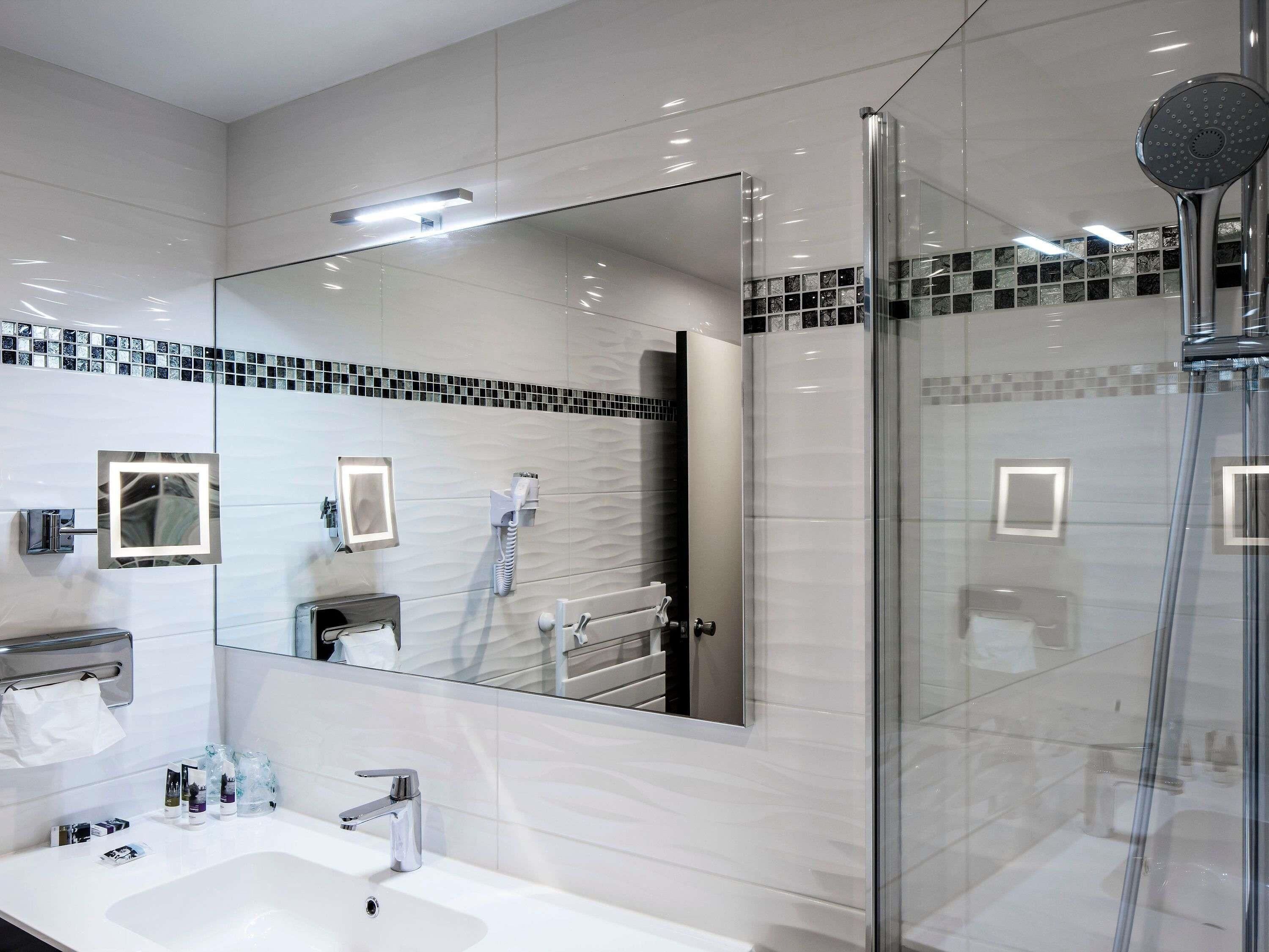 Eco-friendly toiletries, hair dryer, towels