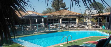 Outdoor pool, open 8:00 AM to 7:00 PM, pool umbrellas, pool loungers
