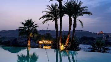 Outdoor pool, pool umbrellas, sun loungers
