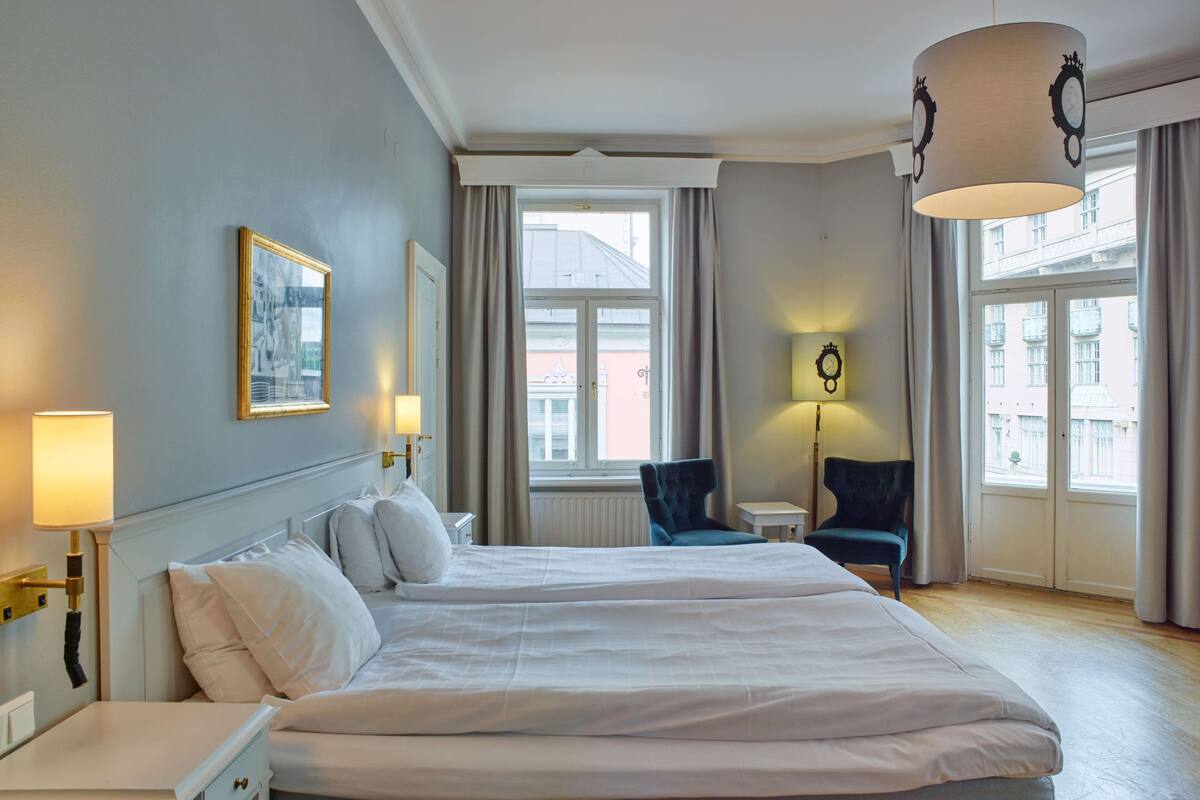 family room (superior) | desk, blackout curtains, iron/ironing board, free wifi