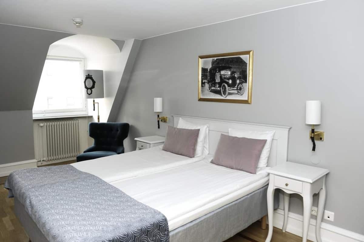 Desk, blackout drapes, iron/ironing board (on request), WiFi (free)