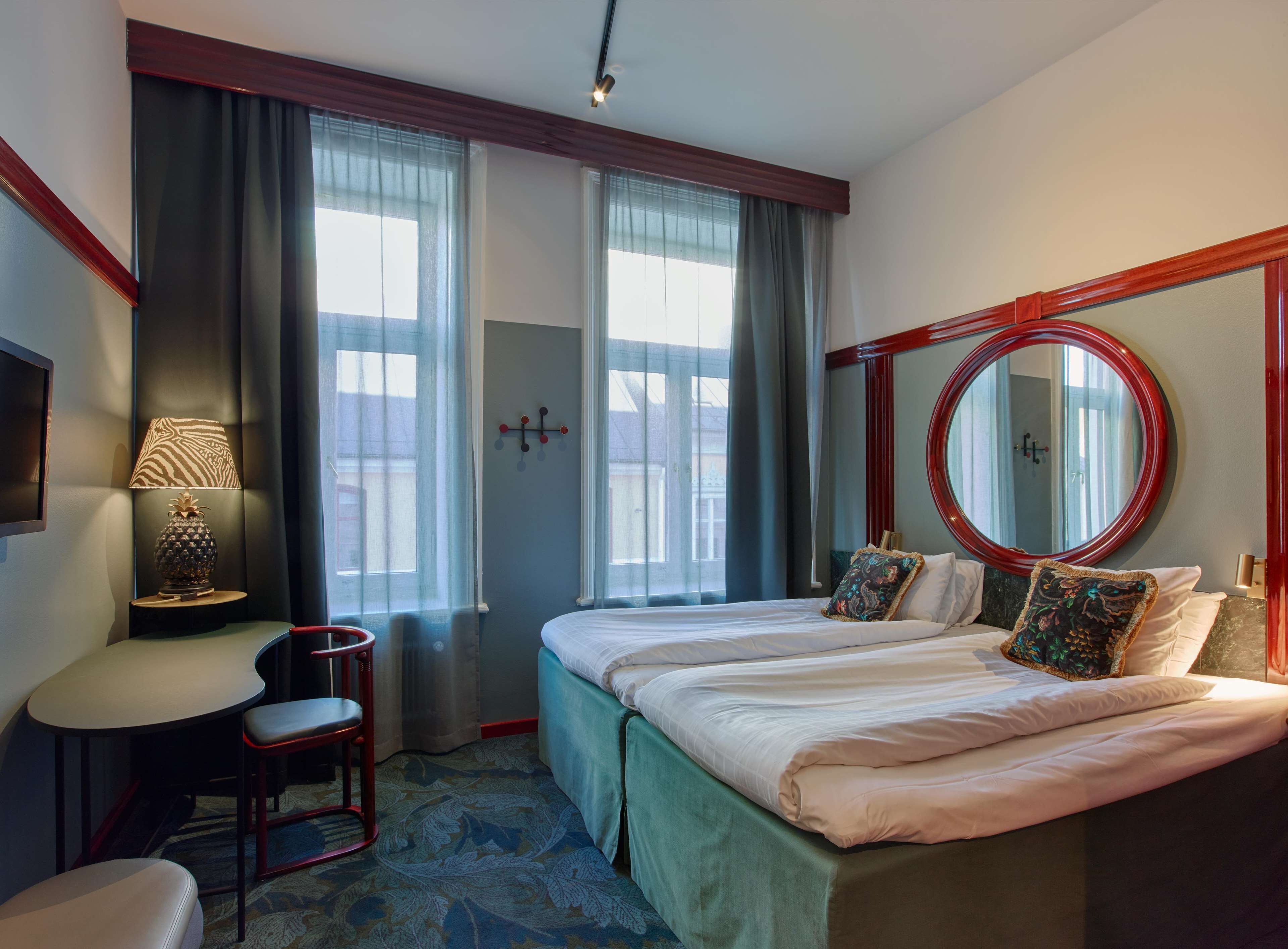 twin room, 2 single beds | desk, blackout curtains, iron/ironing board, free wifi