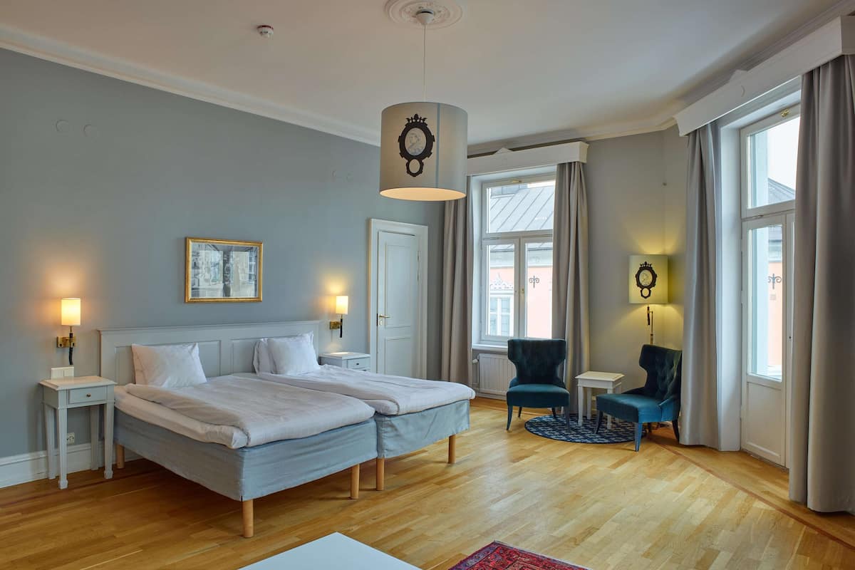 family room (superior) | desk, blackout curtains, iron/ironing board, free wifi