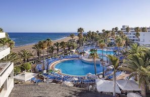 3 outdoor pools, pool umbrellas, pool loungers