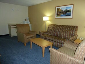 Executive Suite, 1 King Bed with Sofa bed, Non Smoking | Living area | 36-inch flat-screen TV with digital channels - Katahdin Inn & Suites (Millinocket)
