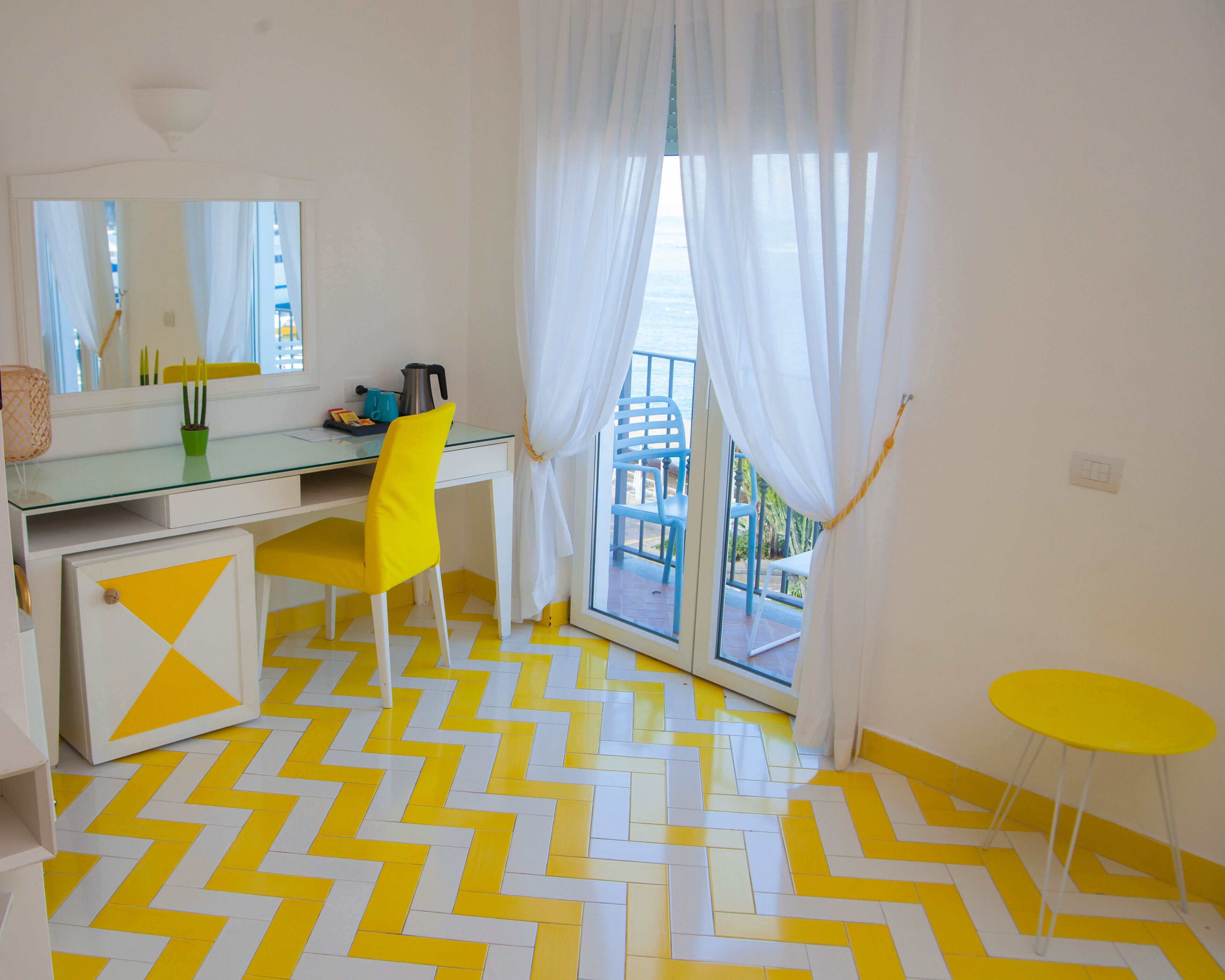 junior studio suite, balcony, sea view | living area | 28-inch flat-screen tv with satellite channels, tv