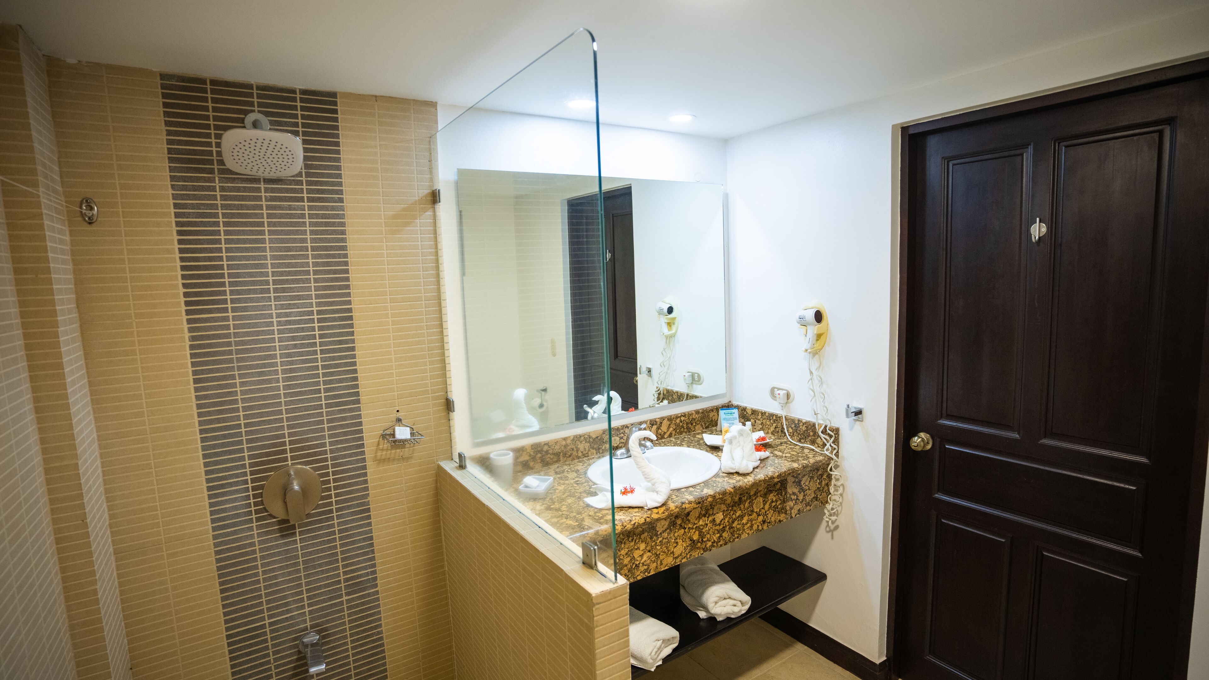 shower, eco-friendly toiletries, hair dryer, towels