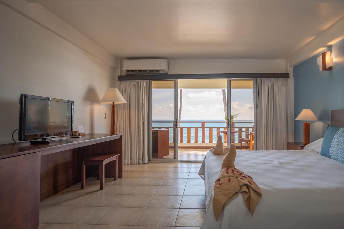 Beachfront Room, 1 King Bed | Minibar, in-room safe, desk, cribs/infant beds