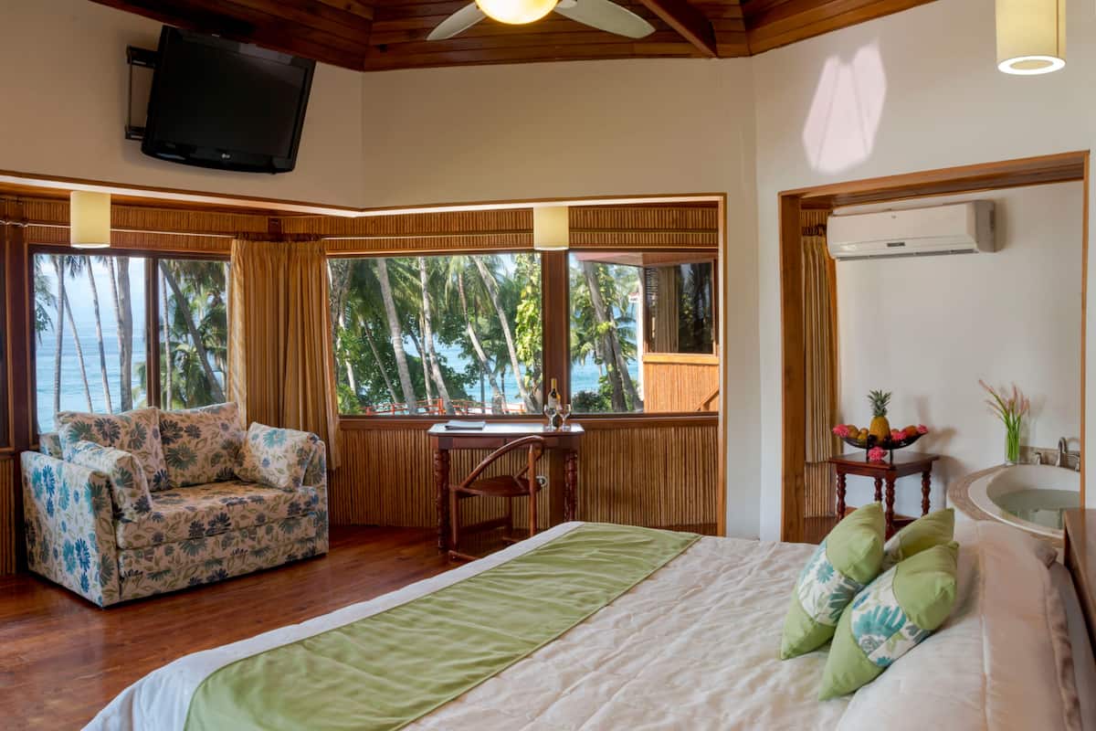 Suite, Ocean View (Tiki Suite) | Minibar, in-room safe, desk, cribs/infant beds