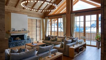 Chalet (Crux) | Área de sala de estar | Televisión de pantalla plana