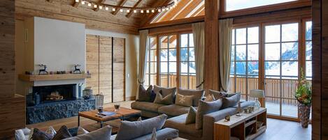Chalet Crux | Living area | Flat-screen TV
