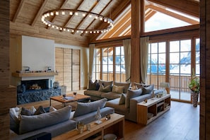 Chalet Crux | Living area | Flat-screen TV