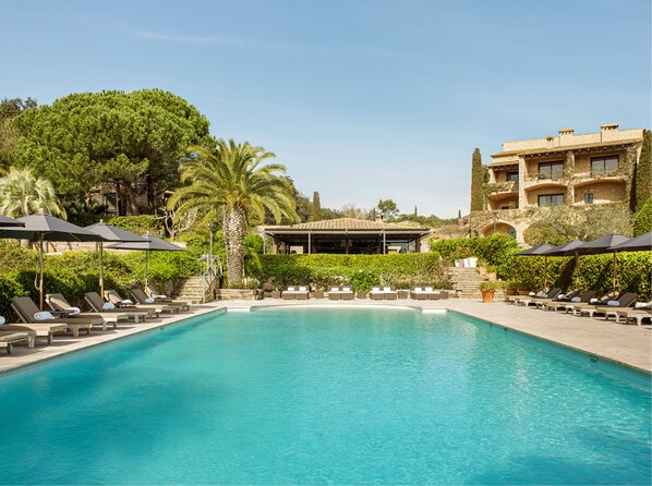 Indoor pool, outdoor pool, pool umbrellas