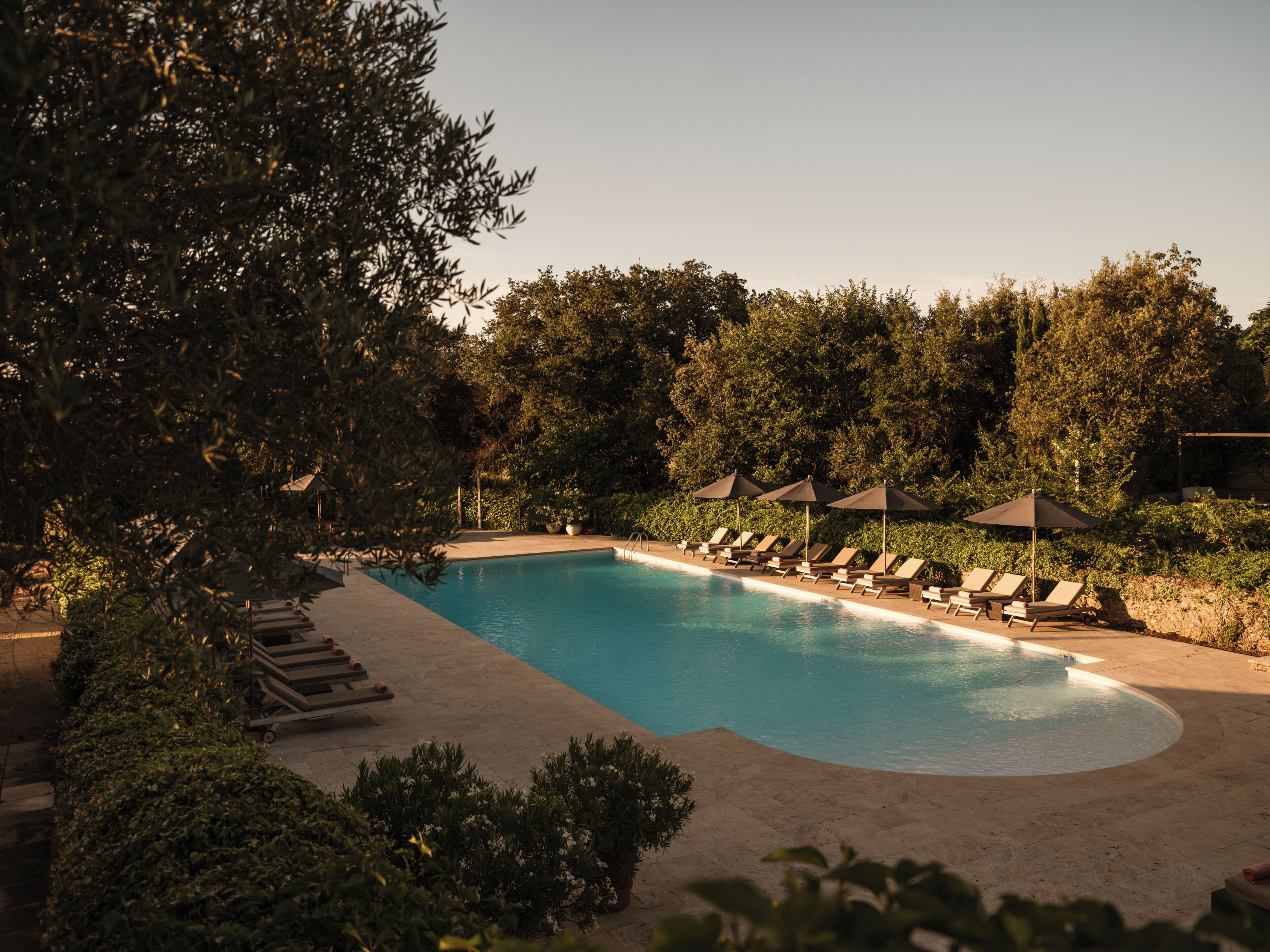 Indoor pool, outdoor pool, pool umbrellas