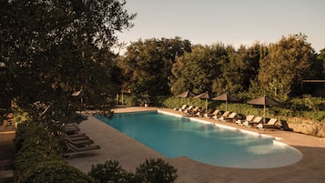Indoor pool, outdoor pool, pool umbrellas