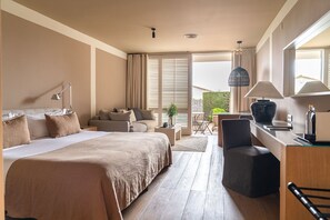 Suite, terrasse, côté jardin (Spa Access included) | Couette en duvet d'oie, minibar, coffres-forts dans les chambres