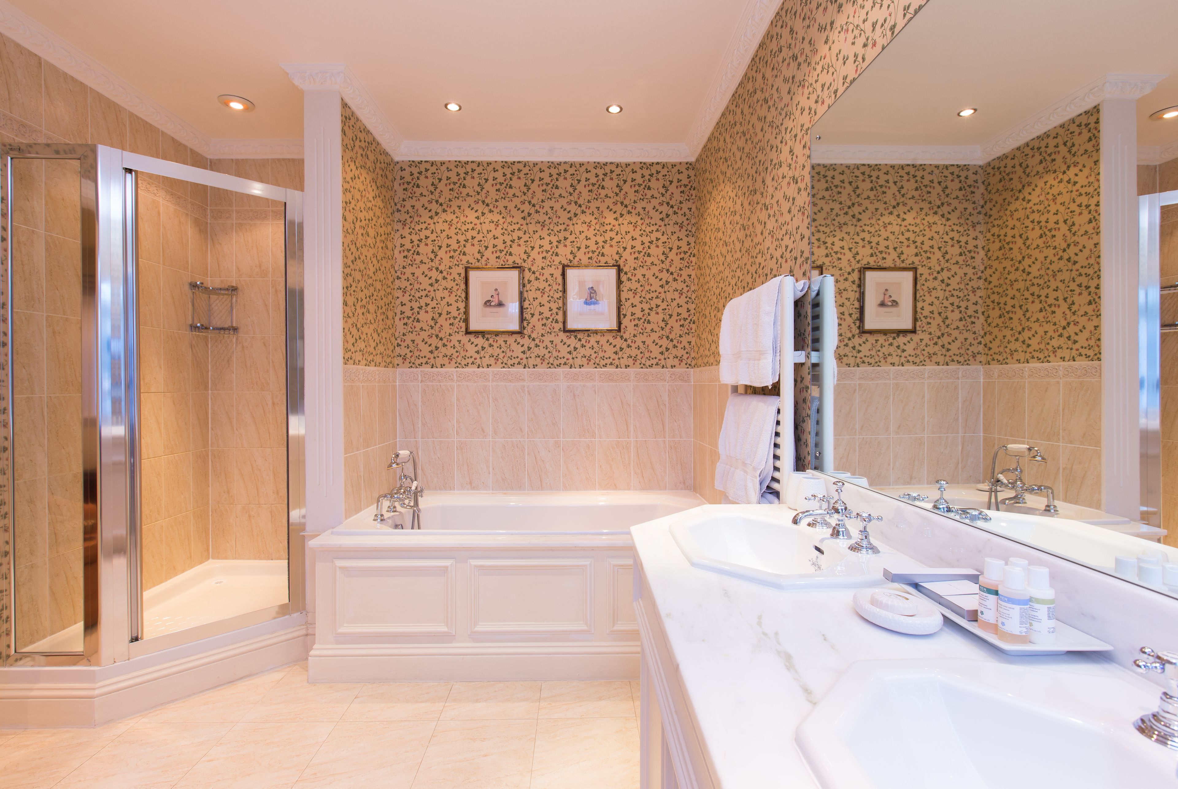 combined shower/bathtub, deep-soaking bathtub, designer toiletries