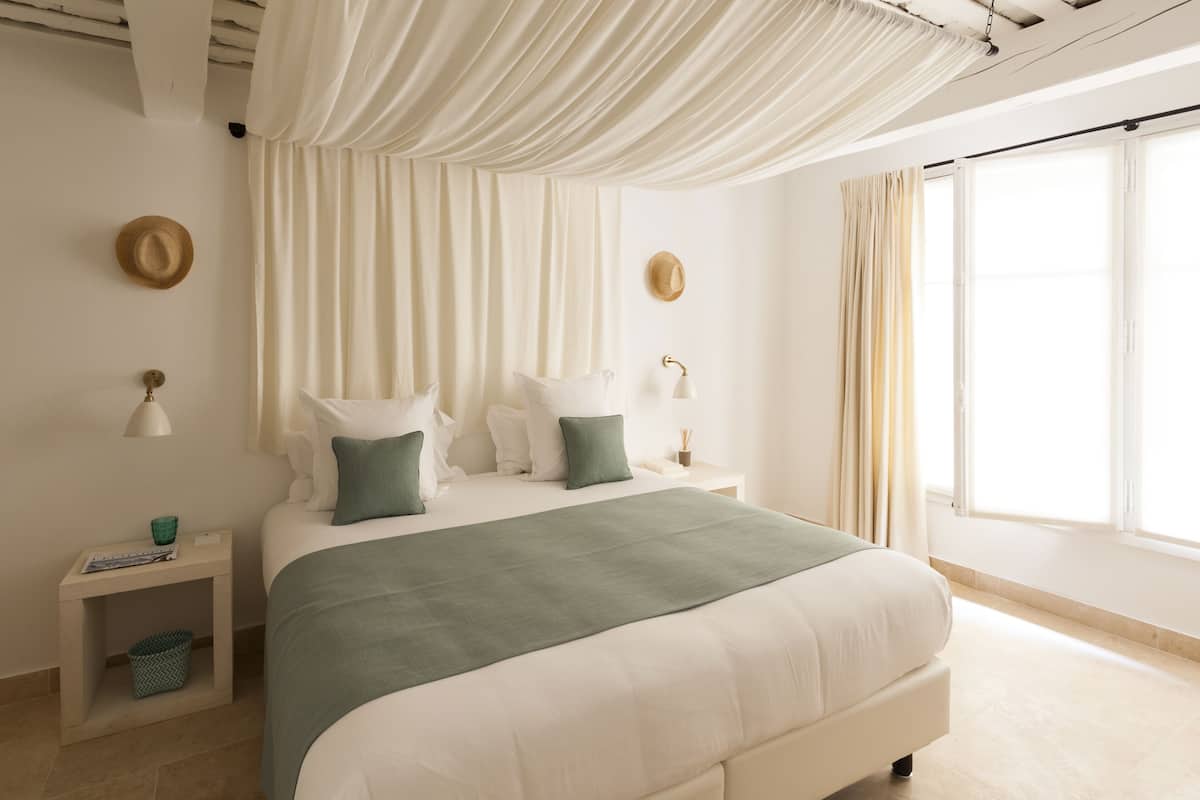 Standard Room | 2 bedrooms, minibar, in-room safe, individually decorated