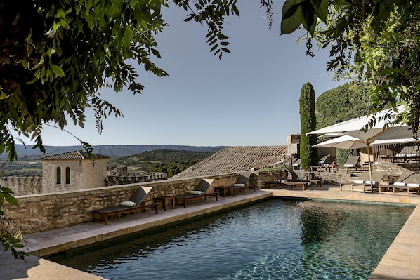 Seasonal outdoor pool, pool umbrellas, pool loungers