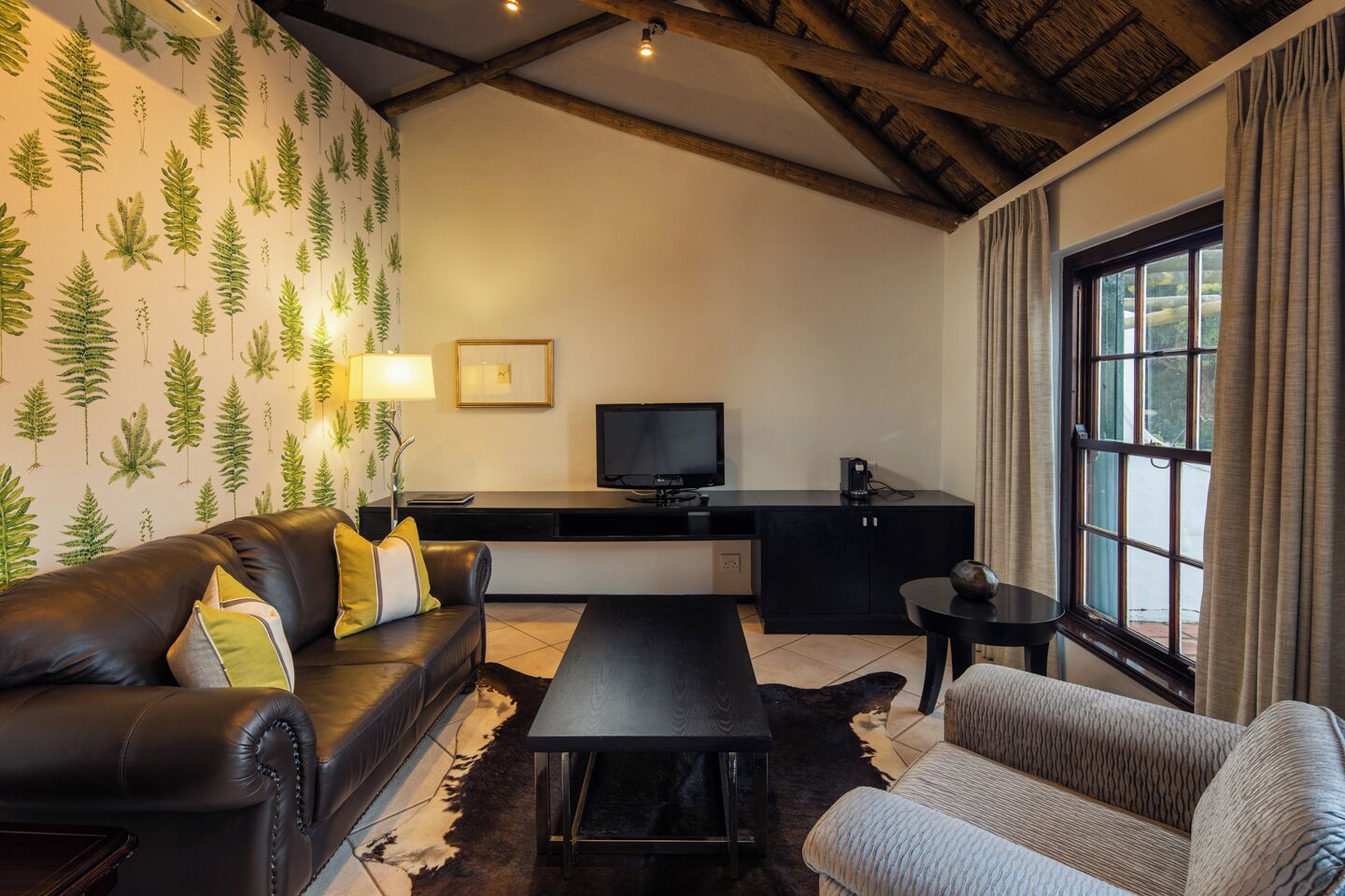 terrace suite | living area | plasma tv, dvd player, pay films