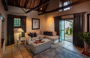 Garden Suite | Living area | Plasma TV, DVD player, pay movies