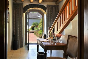 Heritage Suite | Minibar, in-room safe, desk, iron/ironing board