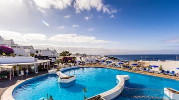 Outdoor pool, pool umbrellas, pool loungers