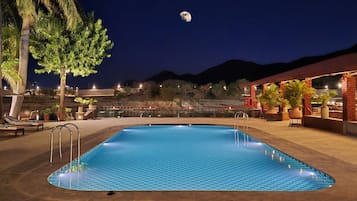 Outdoor pool, open 8:00 AM to 8:00 PM, pool umbrellas, pool loungers